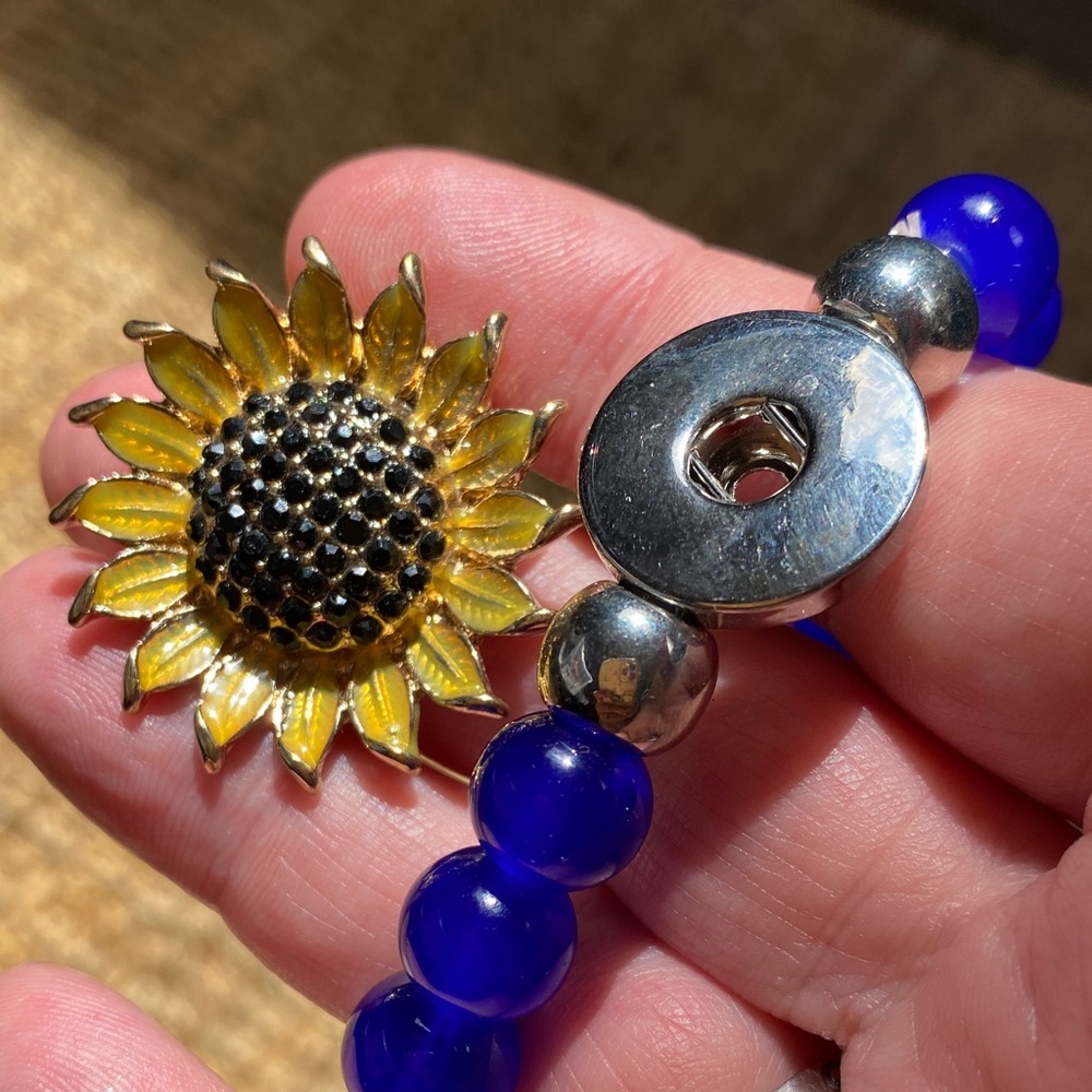 Gold and Blue Beaded Bracelet with Sunflower Charm